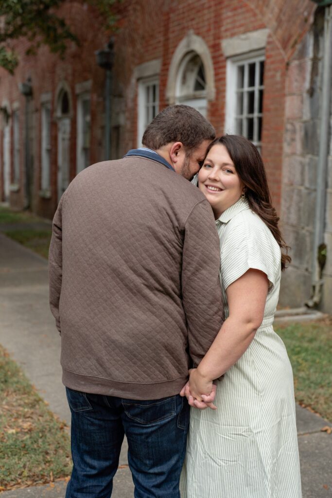 Couple posing for engagement photos