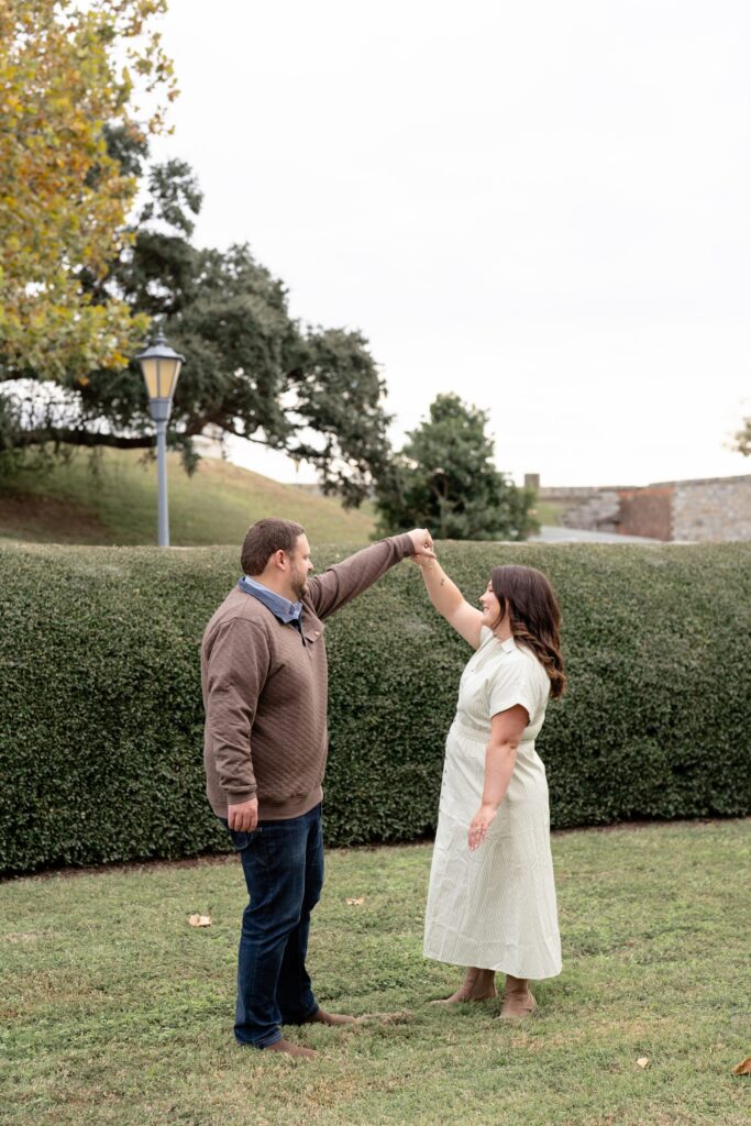 Couple dancing for engagement photos