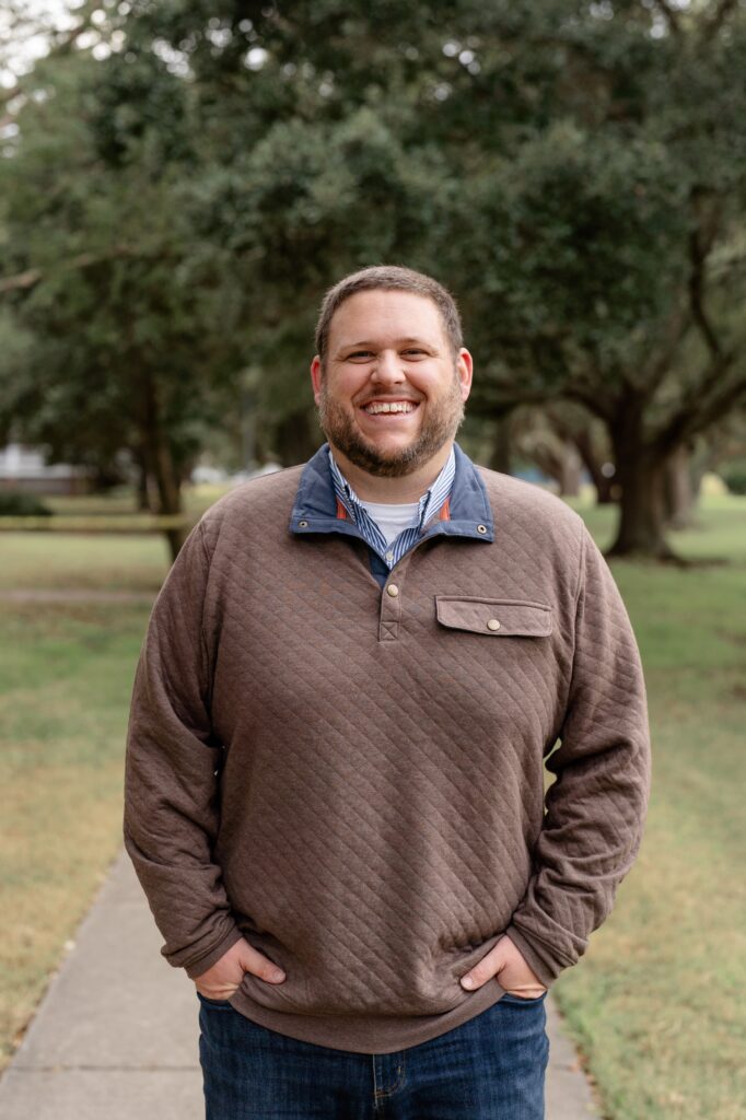 Man smiling for engagement photos