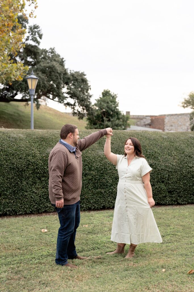 Couple dancing for engagement photos