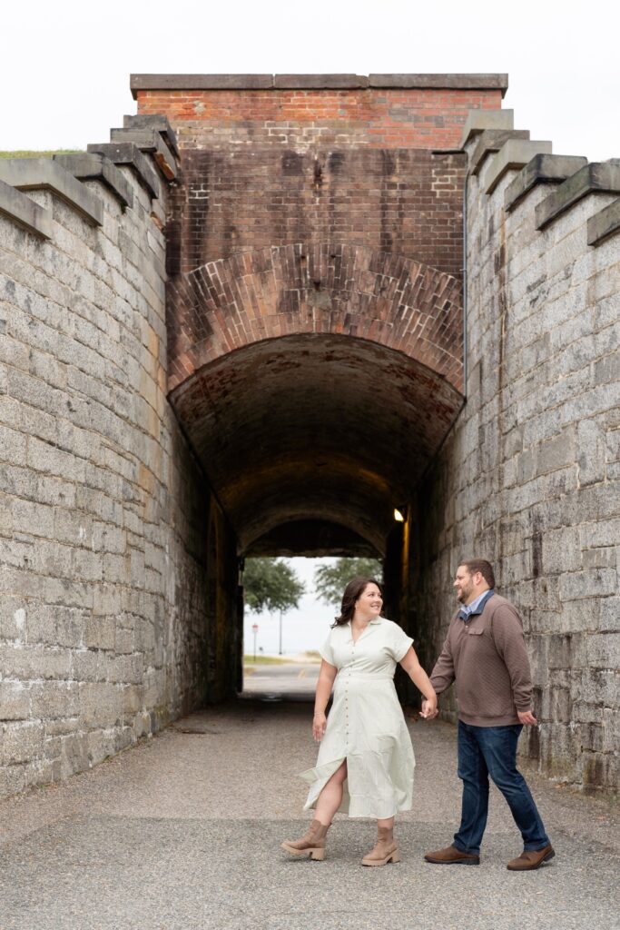 Couple walking and looking at each other