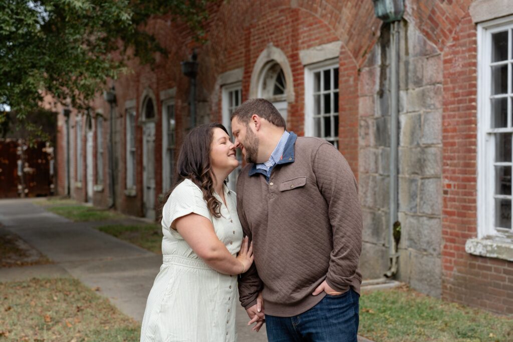 Couple posing for engagement photos