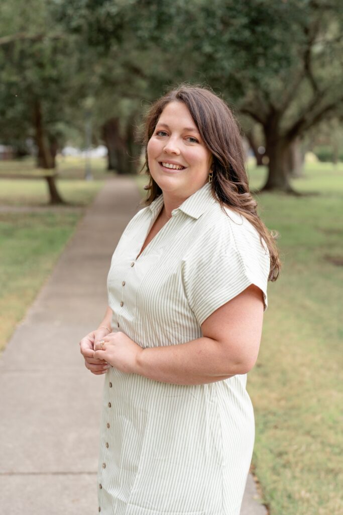 Woman smiling for engagement photos