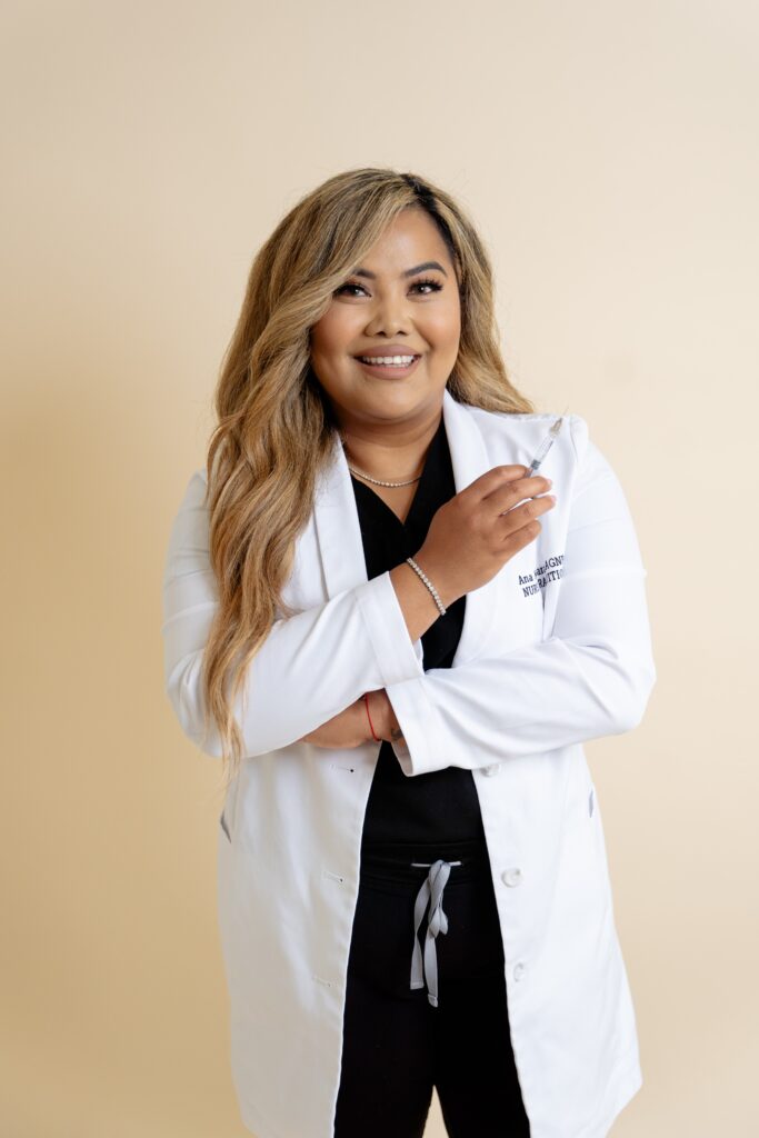 Nurse practitioner smiling at camera for personal branding photoshoot