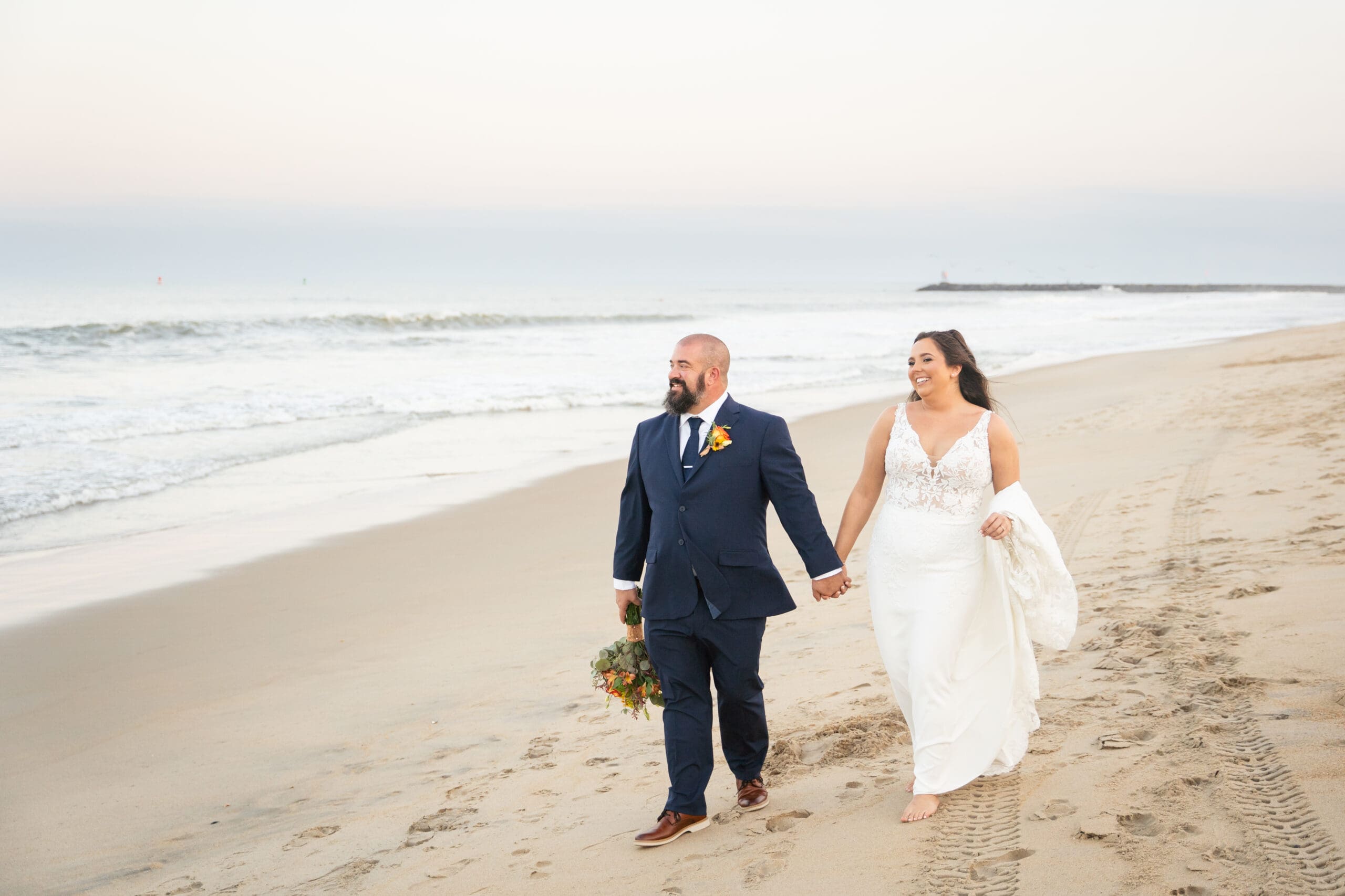 Bride and groom first look on the beach in Virginia Beach