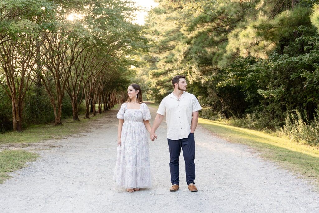 Baby announcement portraits on tree-lined path in Chesapeake, VA