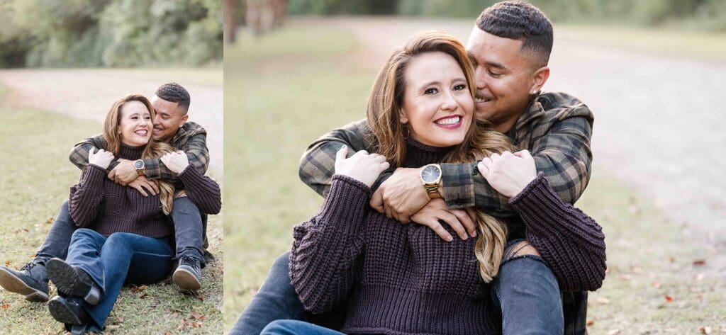 Kellie and Edwin embrace in flannel and casual outfits at sunset