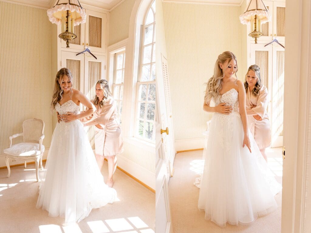 Bride getting into wedding dress in bridal suite at Great Marsh Estate