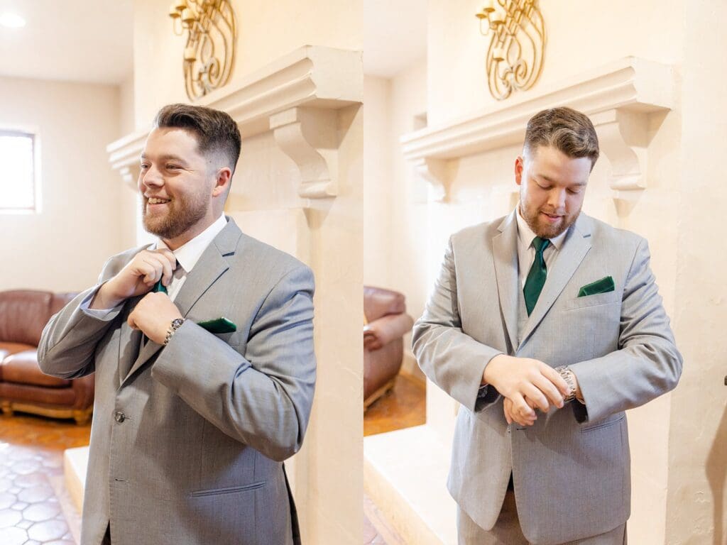 Groom getting ready in grey suit and forest green tie