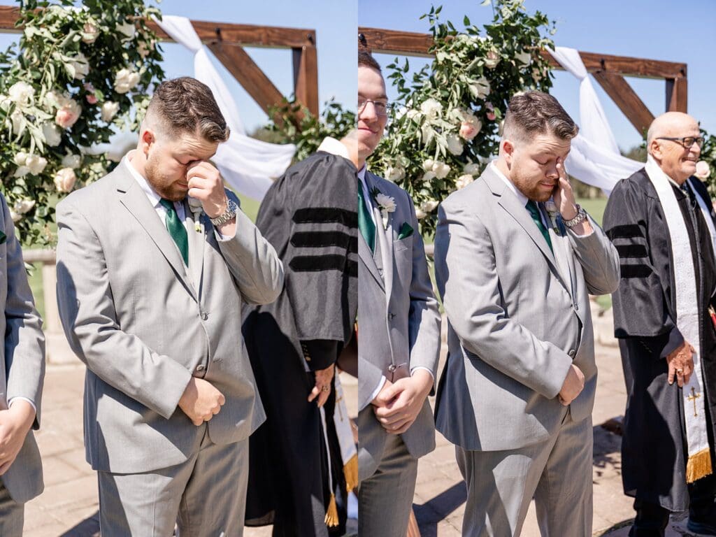 Emotional groom seeing bride for the first time at ceremony