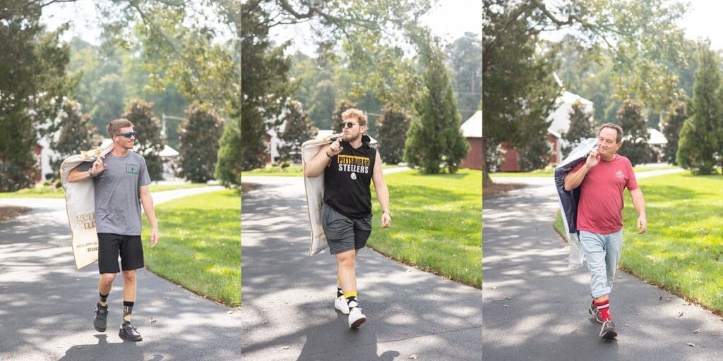 Groomsmen in sports jerseys and custom socks showing off their favorite teams