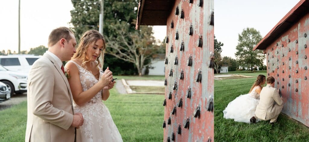 Bride and groom writing on lock to add to barn wall