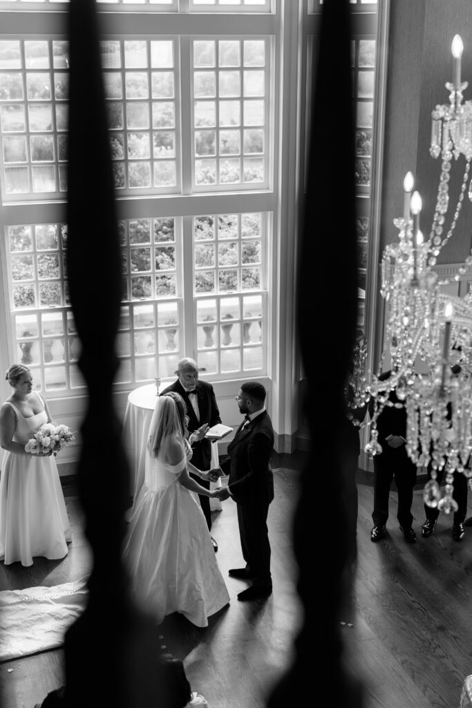 Bride and groom reading vows