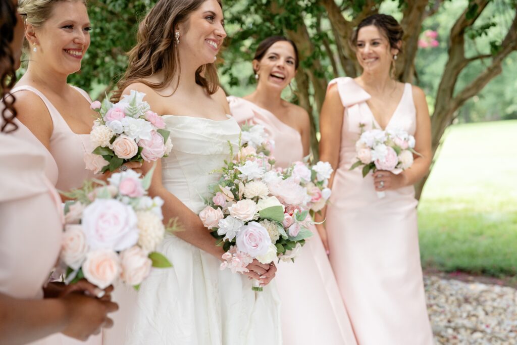 Bride and bridesmaids smiling