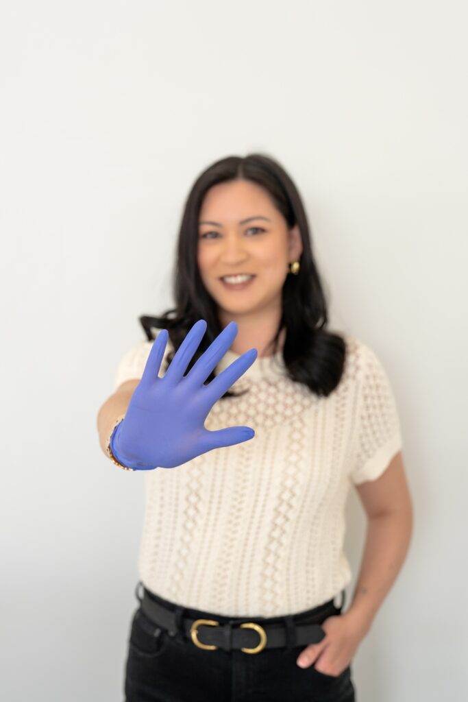 Esthetician wearing glove
