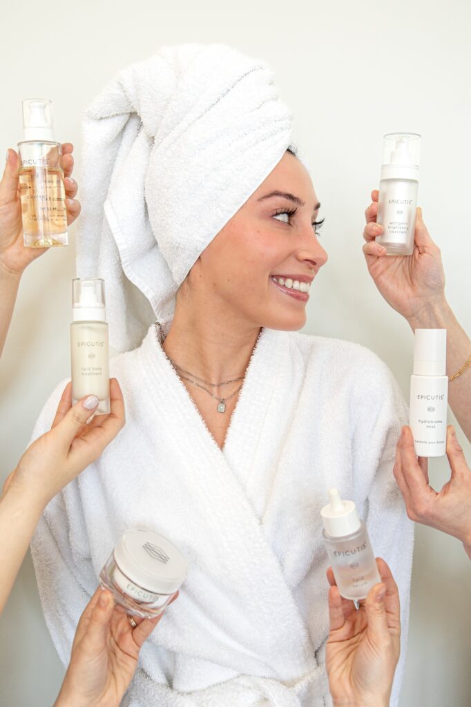 Person's face surrounded by products for branding photoshoot