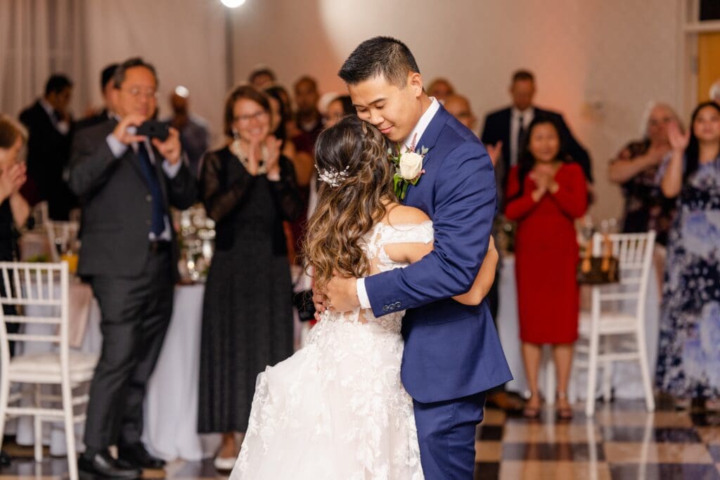 Bride and groom dancing at wedding reception