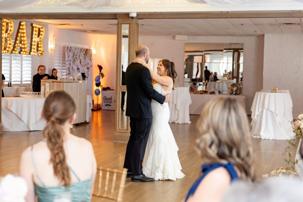 Bride and groom dancing at wedding reception