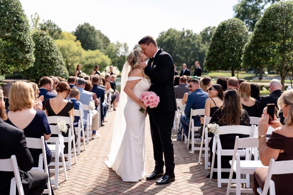 Bride, groom, and guests at The Founders Inn and Spa Virginia Beach wedding venue
