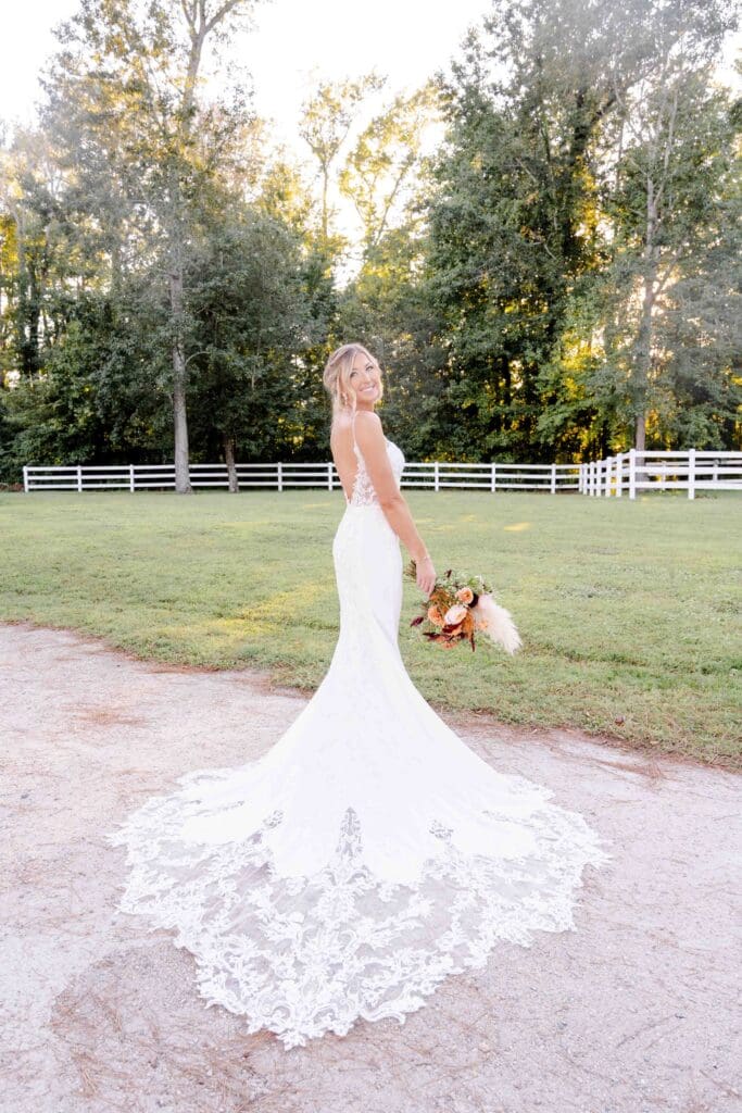 Bride smiling at camera at Culpepper Barn wedding venue in Virginia Beach