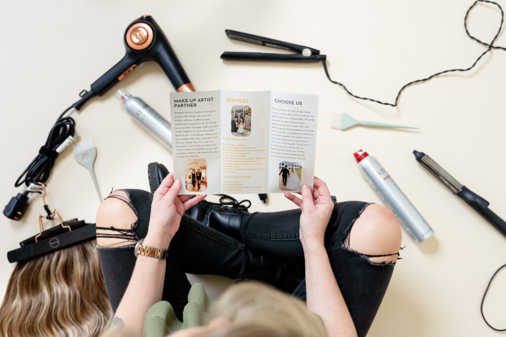 Hair stylist sitting with product for branding photoshoot ideas