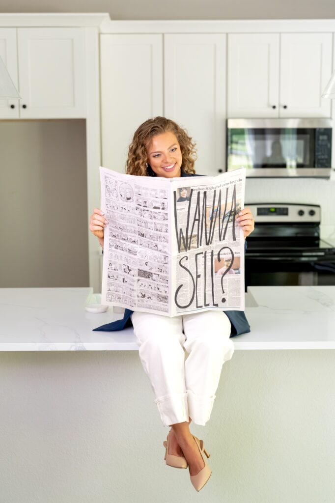 realtor looking at newspaper with text: wanna sell?