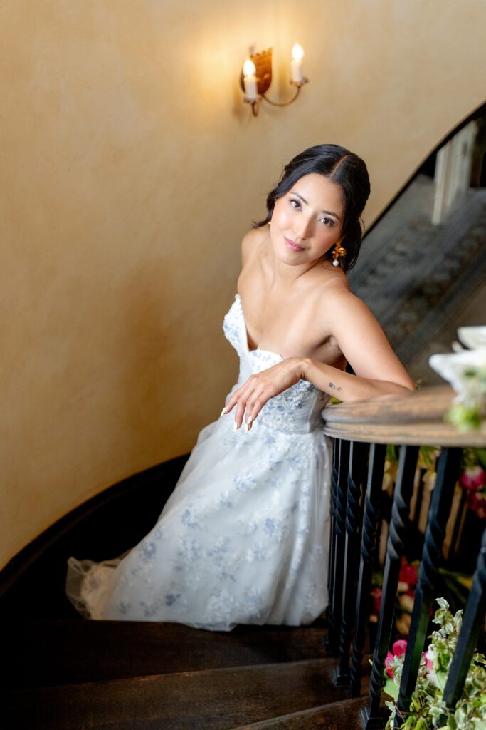 Bride on stairs at Dover Hall