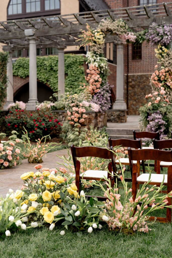Ceremony setup with chairs and flowers