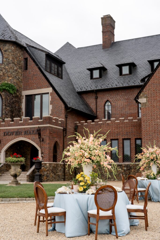 Outdoor wedding reception setup with table and chairs