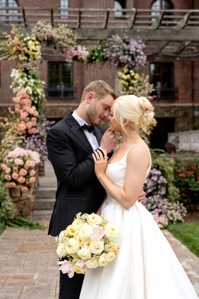 Bride and groom posing for Dover Hall wedding photos